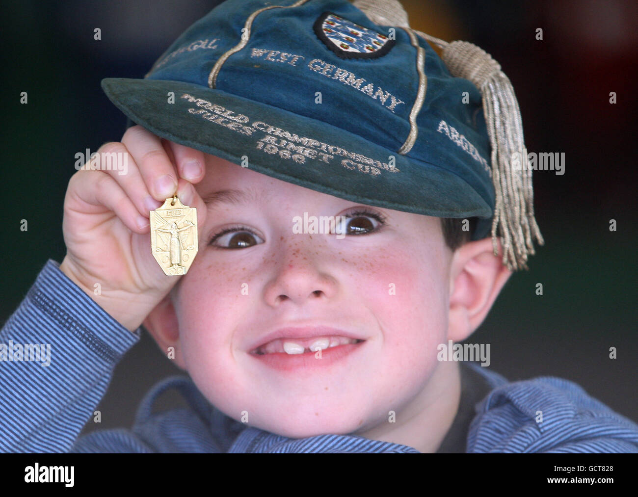 Hugh Convery wearing a 1966 World Cup Cap and holding a Continental Gold 1966 World Cup Medal which will be sold by Convery Auctions, Edinburgh during The Nobby Stiles collection of football memorabilia. PRESS ASSOCIATION Photo. Picture date: Monday October 25, 2010. Photo credit should read: David Cheskin/PA Wire Stock Photo