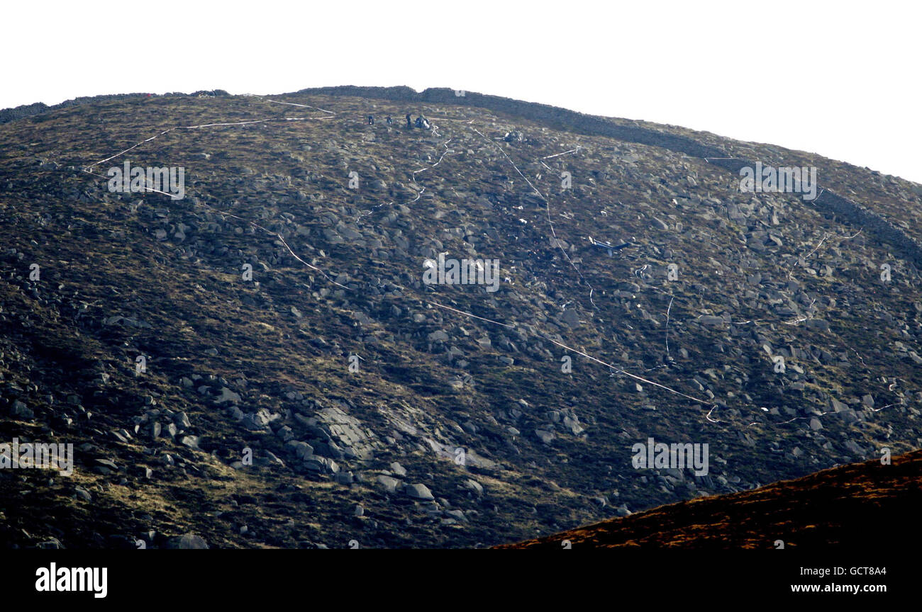 Air accident investigators at the scene where a helicopter crashed in the Mourne Mountains. Stock Photo