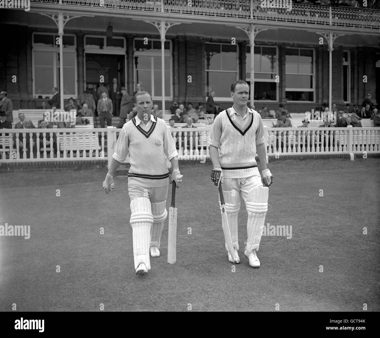Cricket - M.C.C v West Indies - Second Day - Lord's. Thomas Clark (l) and Brian Close go out together to open for the M.C.C Stock Photo