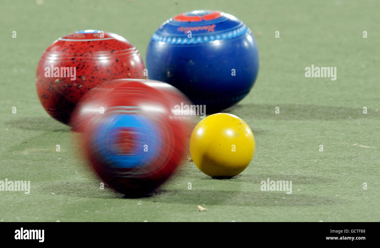 A bowl hits the jack during the lawn bowls women's triple bronze medal final during Day Seven of the 2010 Commonwealth Games at the Jawaharlal Sports Complex in New Dehli, India. Stock Photo