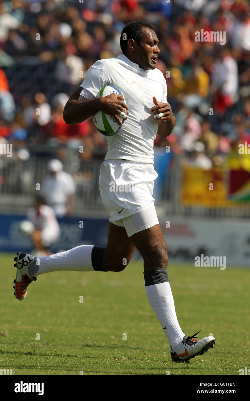 England's Iosa Damudamu runs to score a try against Sri Lanka in the Rugby 7's round of pool matches at the Delhi University Stadium in Delhi, India Stock Photo