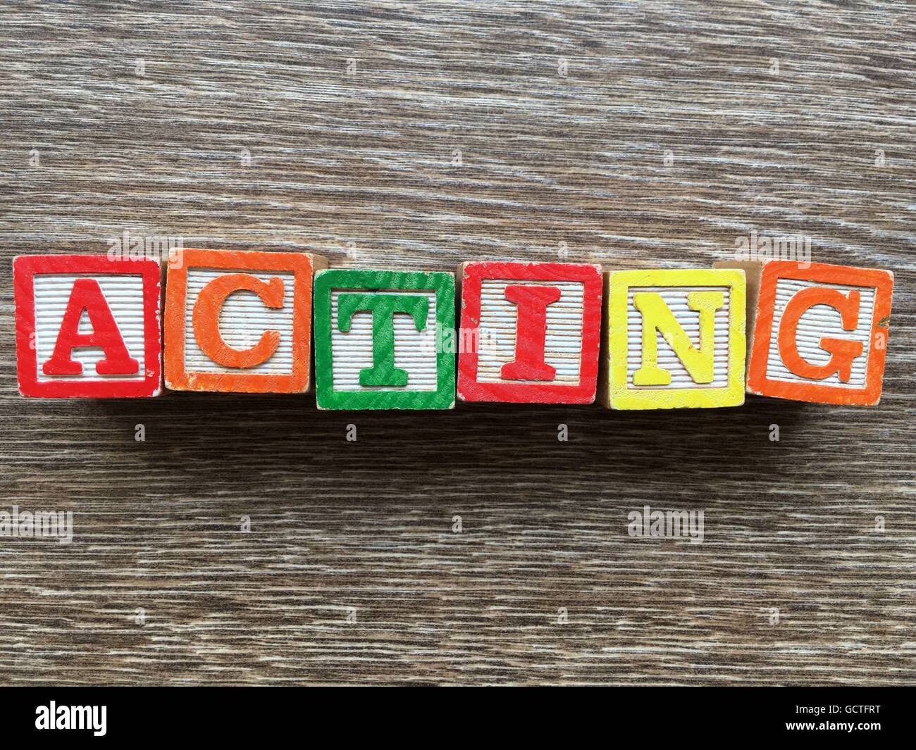ACTING word written with wood block letter toys Stock Photo