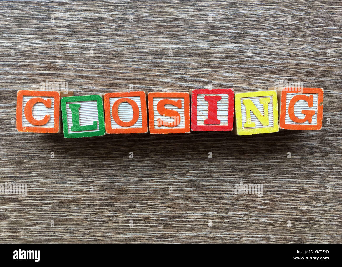 CLOSING word written with wood block letter toys Stock Photo