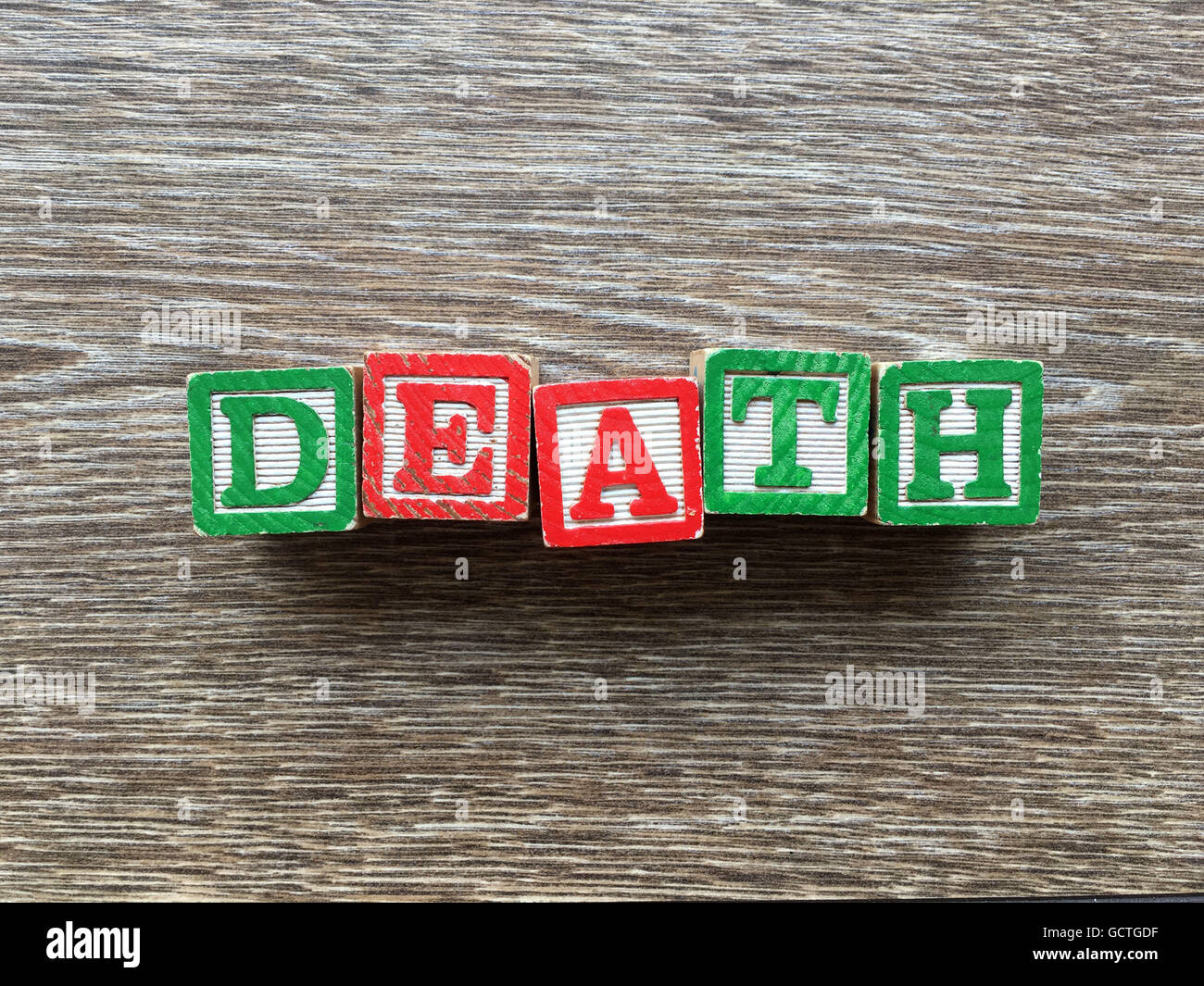 End word written wood block hi-res stock photography and images