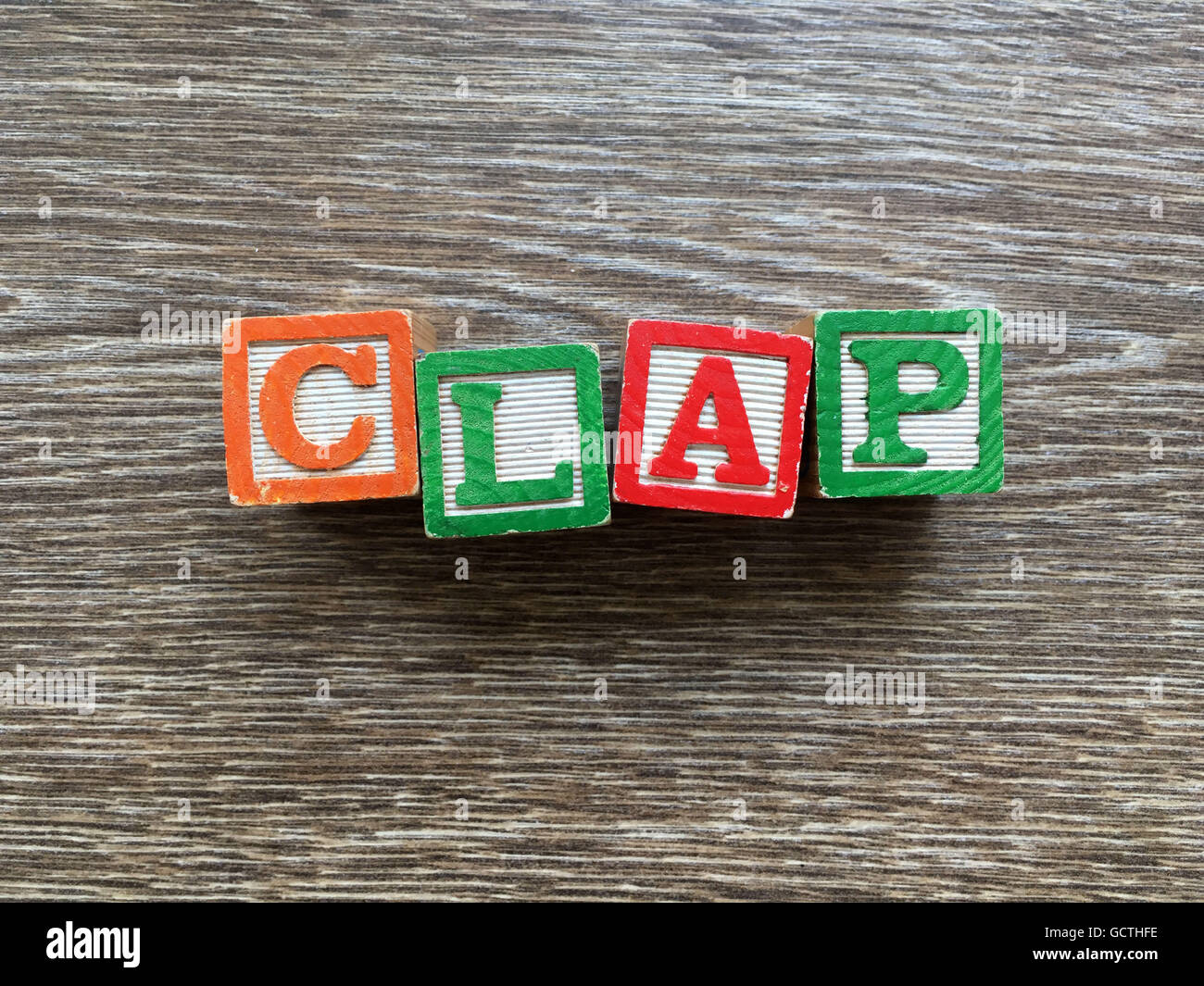 CLAP word written with wood block letter toys Stock Photo