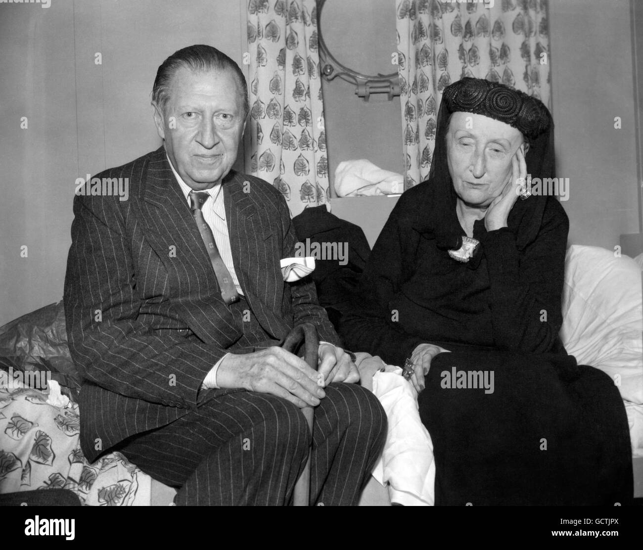 Dame Edith Sitwell, the 69-year-old poet, essayist, novelist and historian, with her brother, poet Sir Osbert Sitwell, on their arrival at Southampton aboard the liner SS United States. Stock Photo
