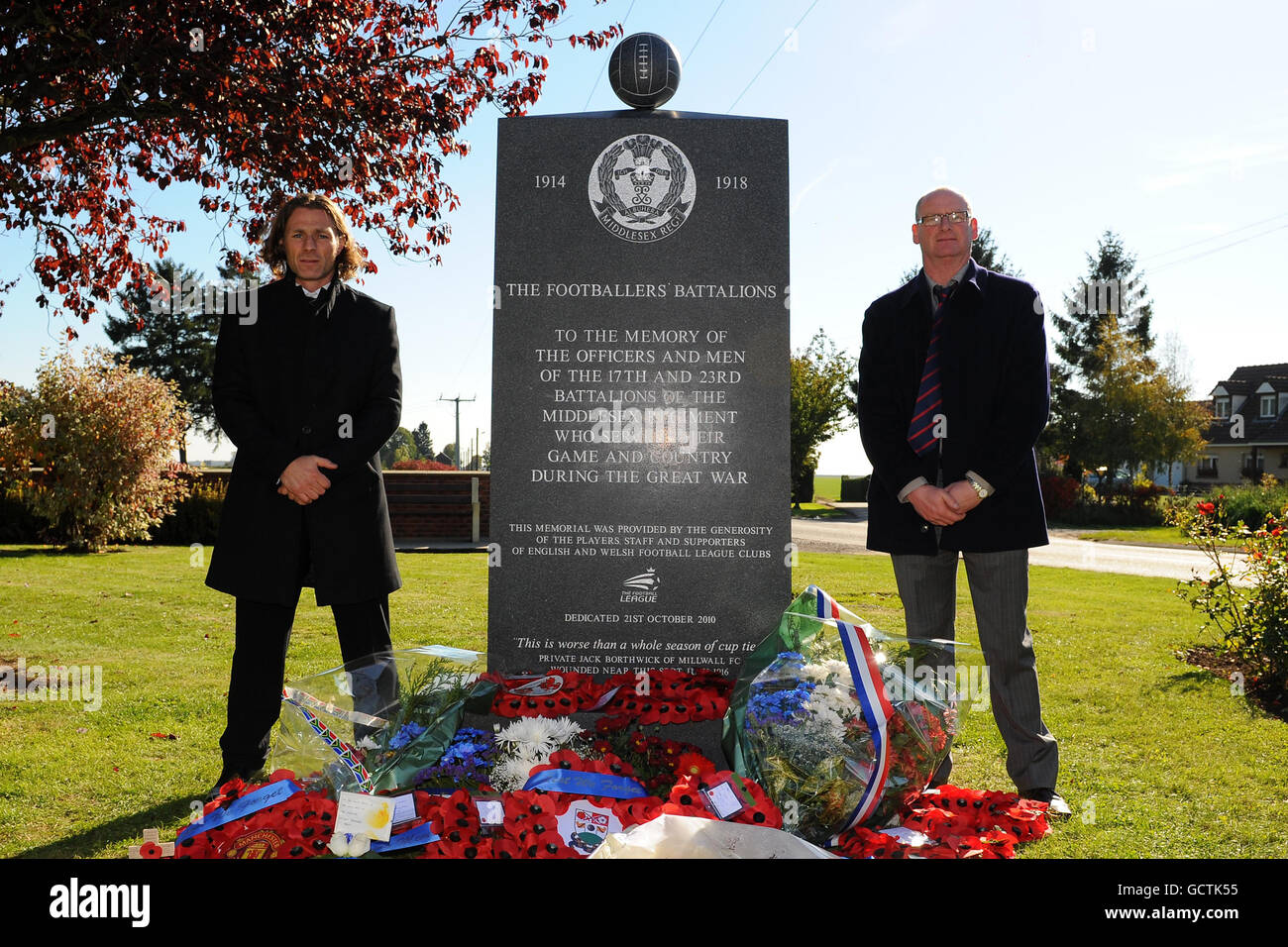 Wycombe Wanderers' Gareth Ainsworth and organiser of the Footballers' Battalions Memorial Phil Stant during the Football Battalion Memorial unveiling in Longueval, France. Stock Photo