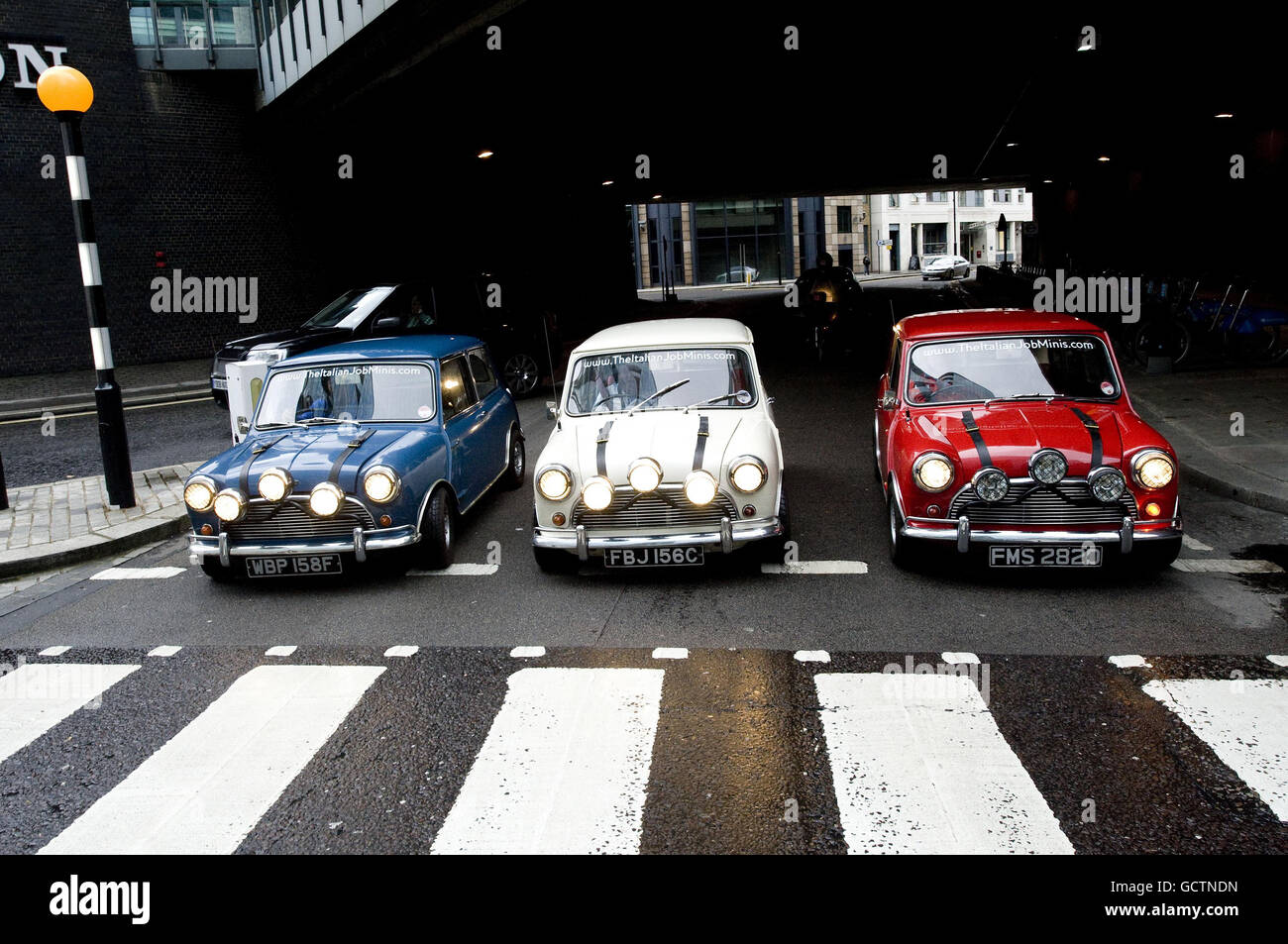 Three original 1960's mini coopers, used by Paramount Pictures to promote the 1969 film The Italian Job, which will go on show at the Museum Of London from today until November 14. Stock Photo