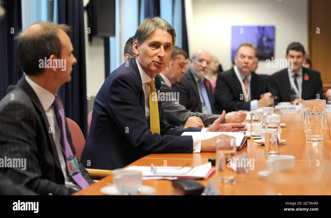 Transport Secretary Philip Hammond (centre) chairs a high level meeting