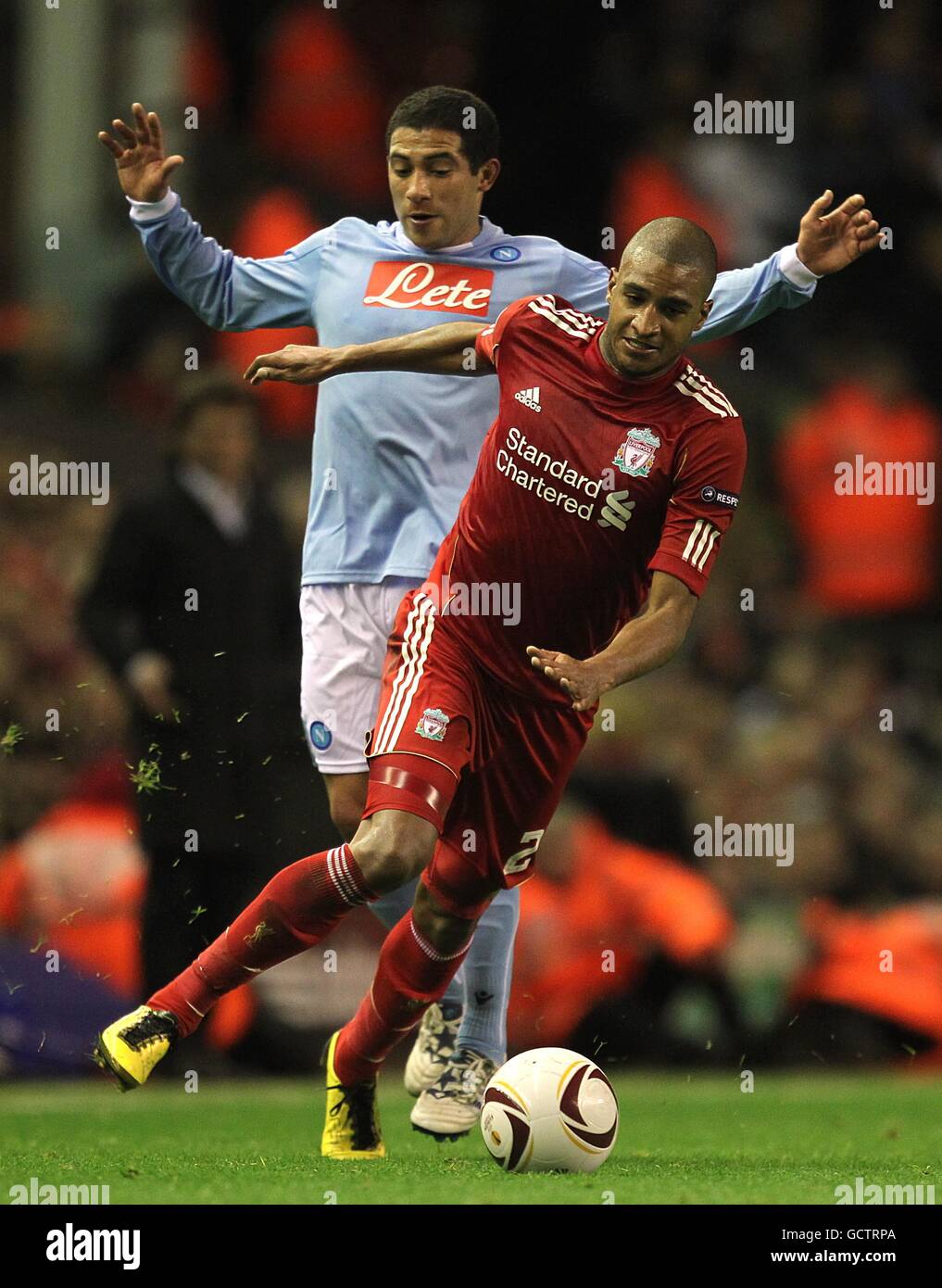 Soccer - UEFA Europa League - Group K - Liverpool v Napoli - Anfield. Liverpool's David Ngog (right) and Napoli's Walter Gargano battle for the ball Stock Photo