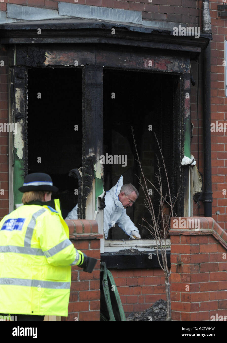 police-forensic-officers-scene-house-fire-in-bridlington-hi-res-stock