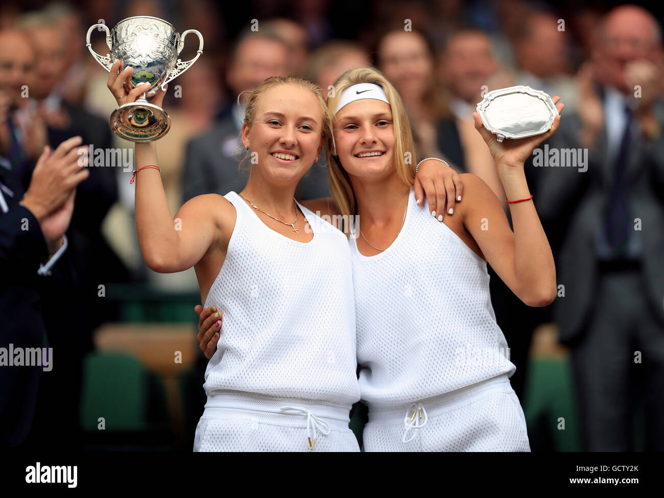 Anastasia Potapova (left) and Dayana Yastremska with their trophies for