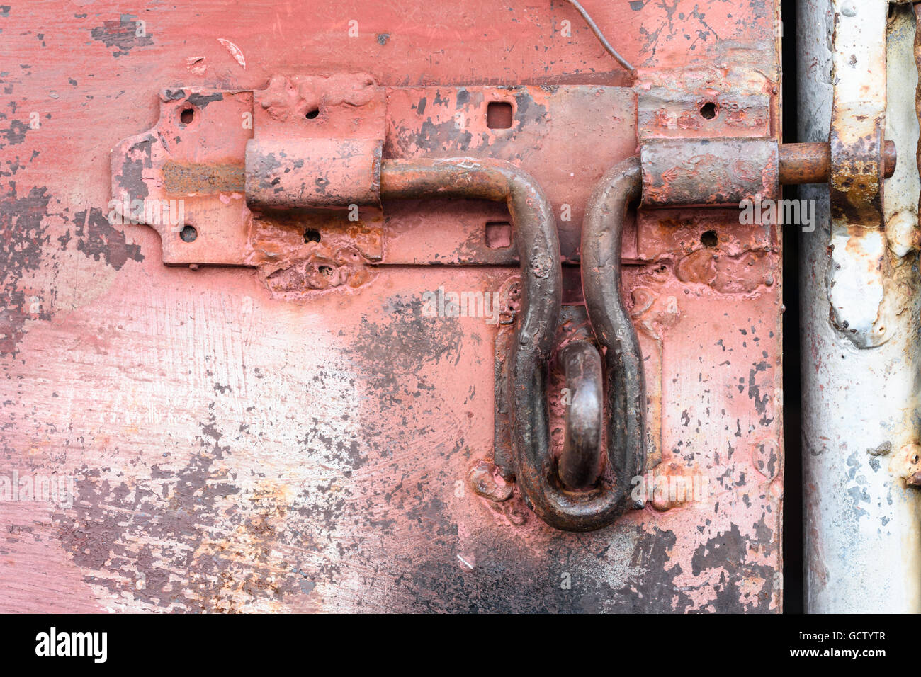 the iron door doesn't lock old and dirty Stock Photo