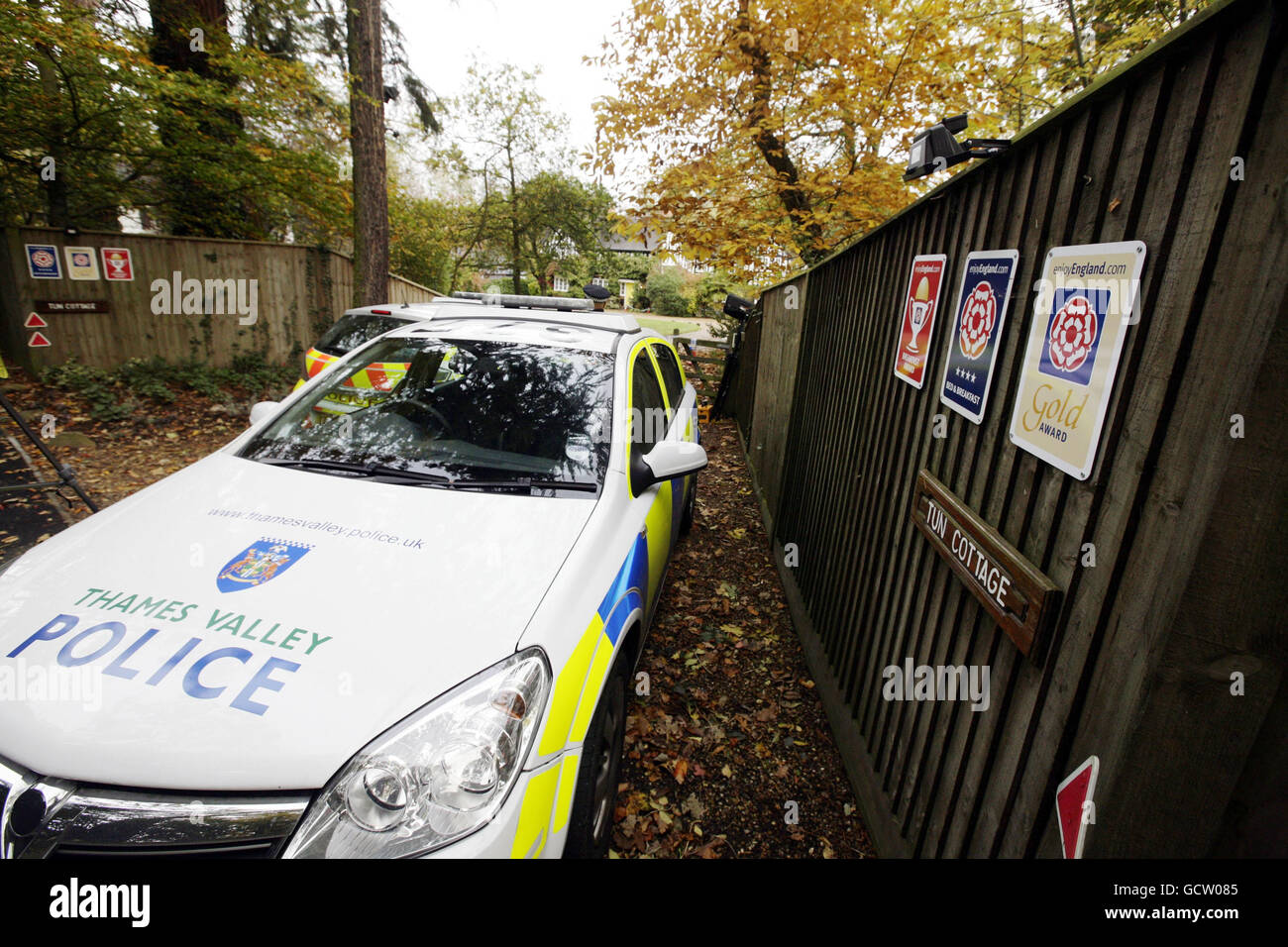 Police remain at the Tun Cottage in Ascot, Berkshire where they