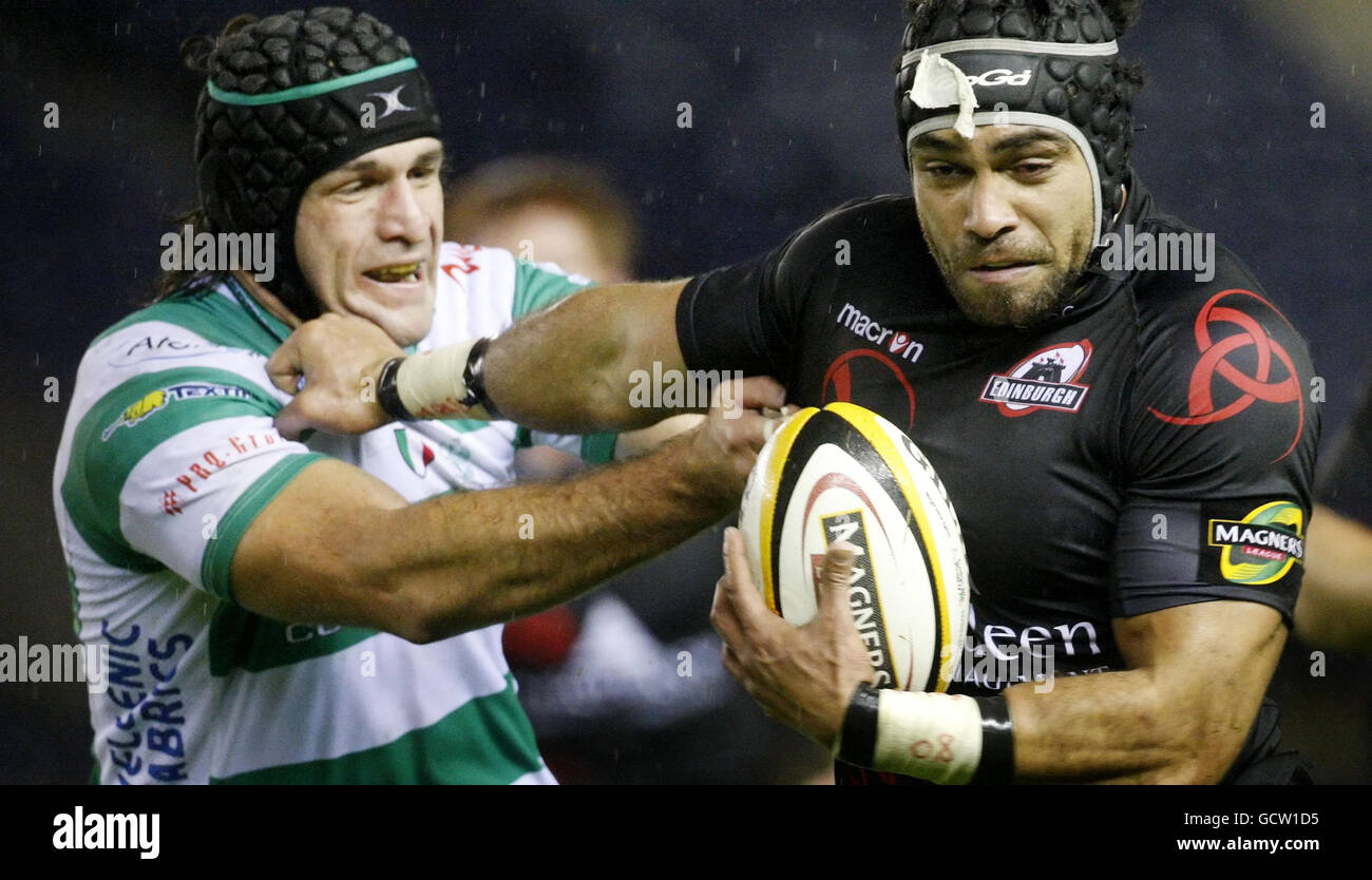 Edinburgh's Talei Netani (right) and Pavanello Enrico (left)battle for the ball during the Magners League match at Murrayfield, Edinburgh. Stock Photo