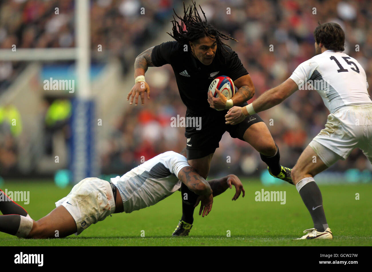 New Zealand's Ma'a Nonu is tackled by England's Courtney Lawes during the International match at Twickenham, London. Stock Photo