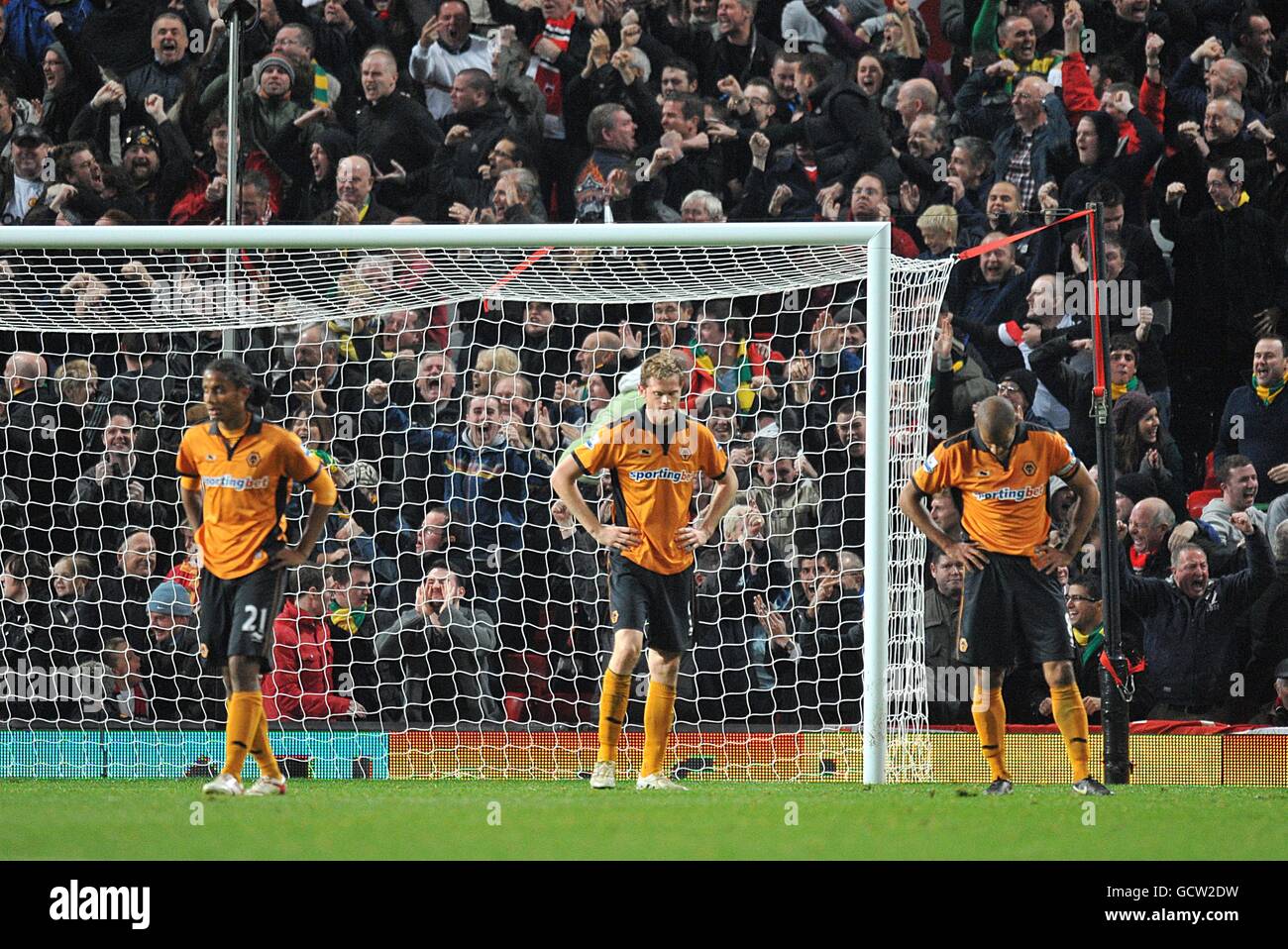 (L-R) Wolverhampton Wanderers' Michael Mancienne, Richard Stearman and Karl Henry stand dejected after Manchester United's Ji-Sung Park (not in picture) scored the winning goal Stock Photo