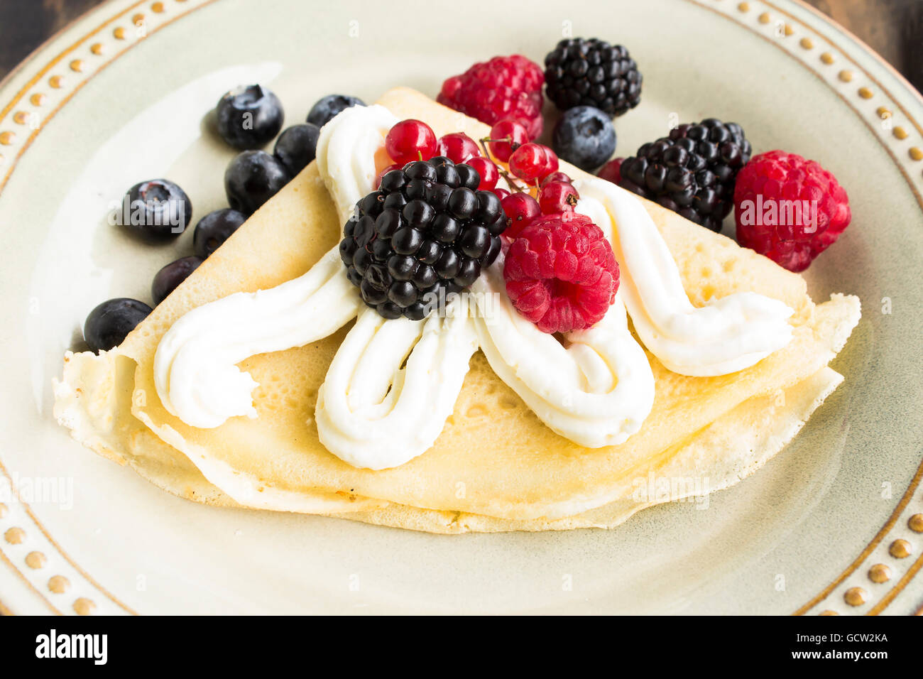 Crepe with Berries and Whipped Cream Stock Photo Alamy