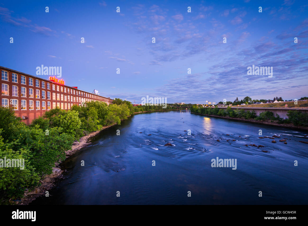 The Merrimack River at night, in downtown Manchester, New Hampshire. Stock Photo