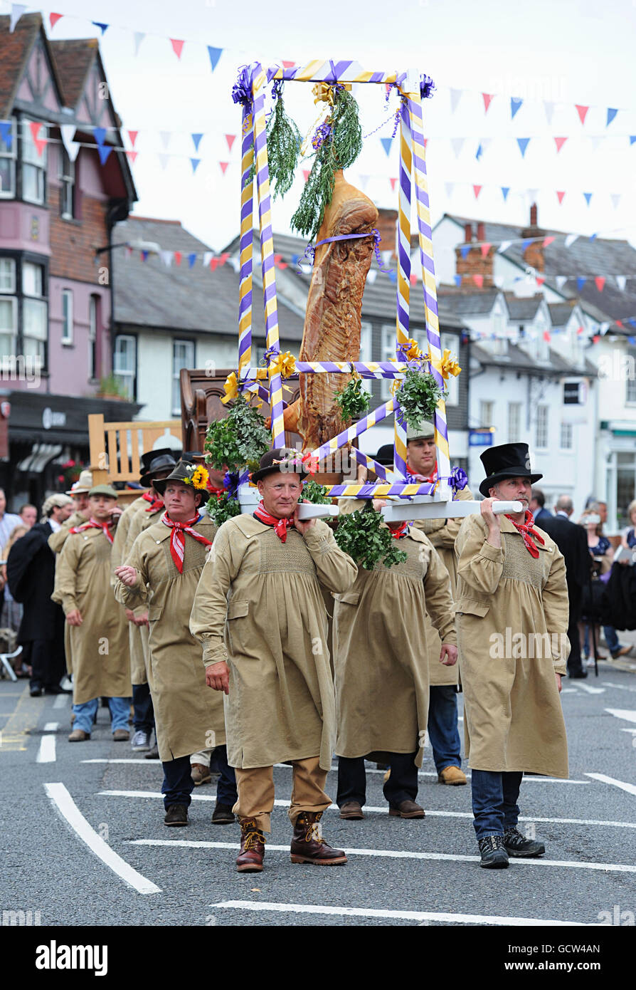 Flitch bearers carry the flitch during the Dunmow Flitch trials in Great Dunmow, Essex, a tradition that goes back to the early 12th century, where successful couples take an oath and are presented with a flitch of bacon. Stock Photo