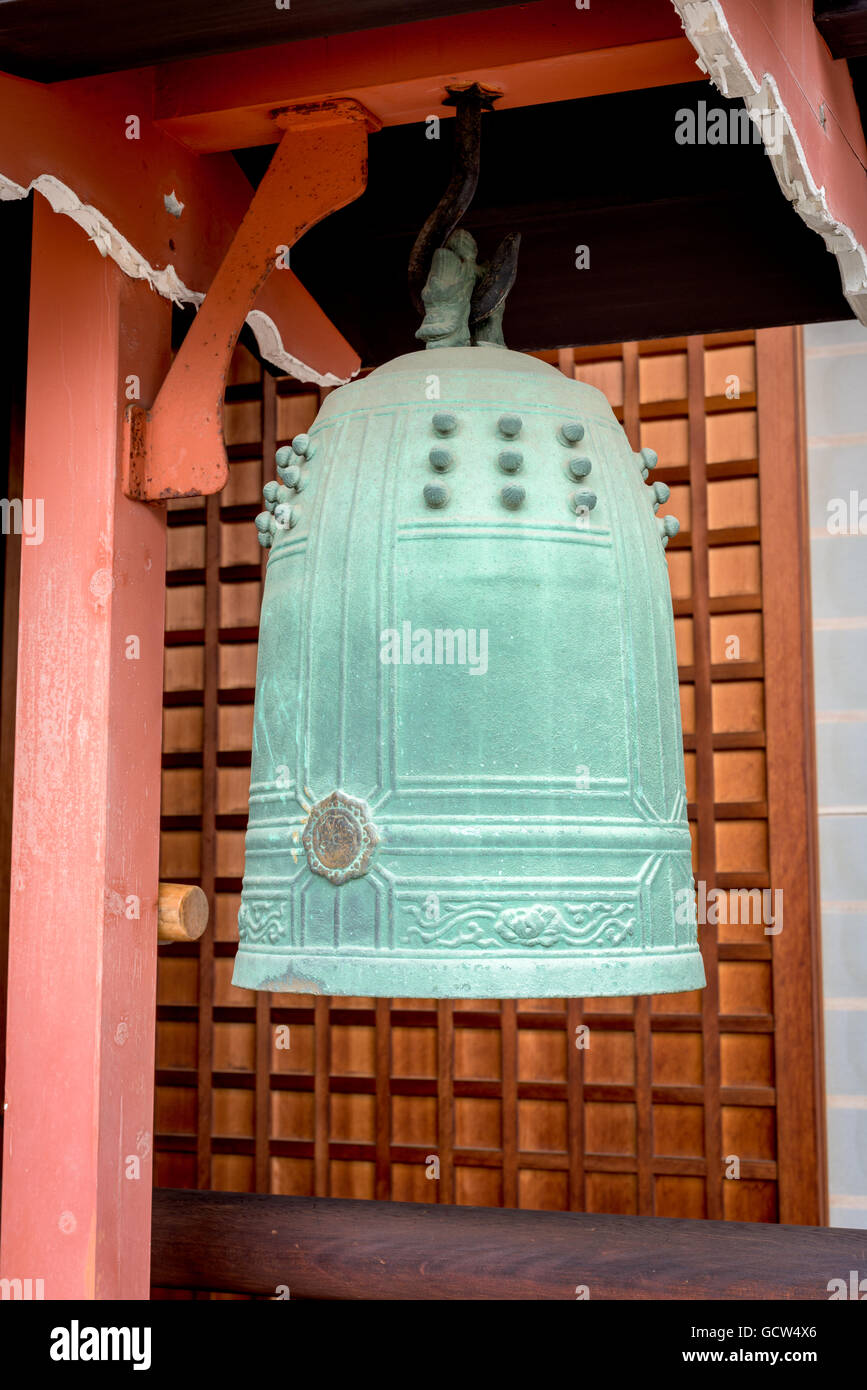 Classic green Japanese bell used for worship Stock Photo Alamy