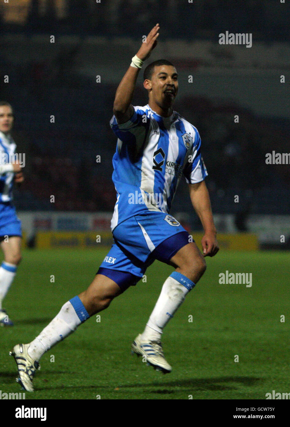Huddersfield Town's Lee Peltier celebrates scoring his sides first goal during the first round replay match at the Galpharm Stadium, Huddersfield. Stock Photo