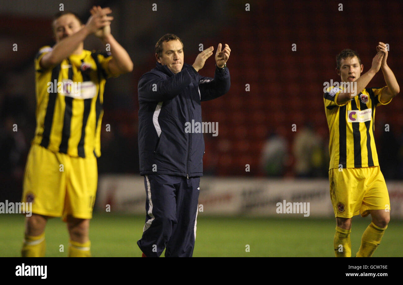 Fleetwood Town Manager Micky Mellon shows his dejection after their 2-0 defeat to Walsall in the first round replay match at Banks' Stadium, Walsall. Stock Photo