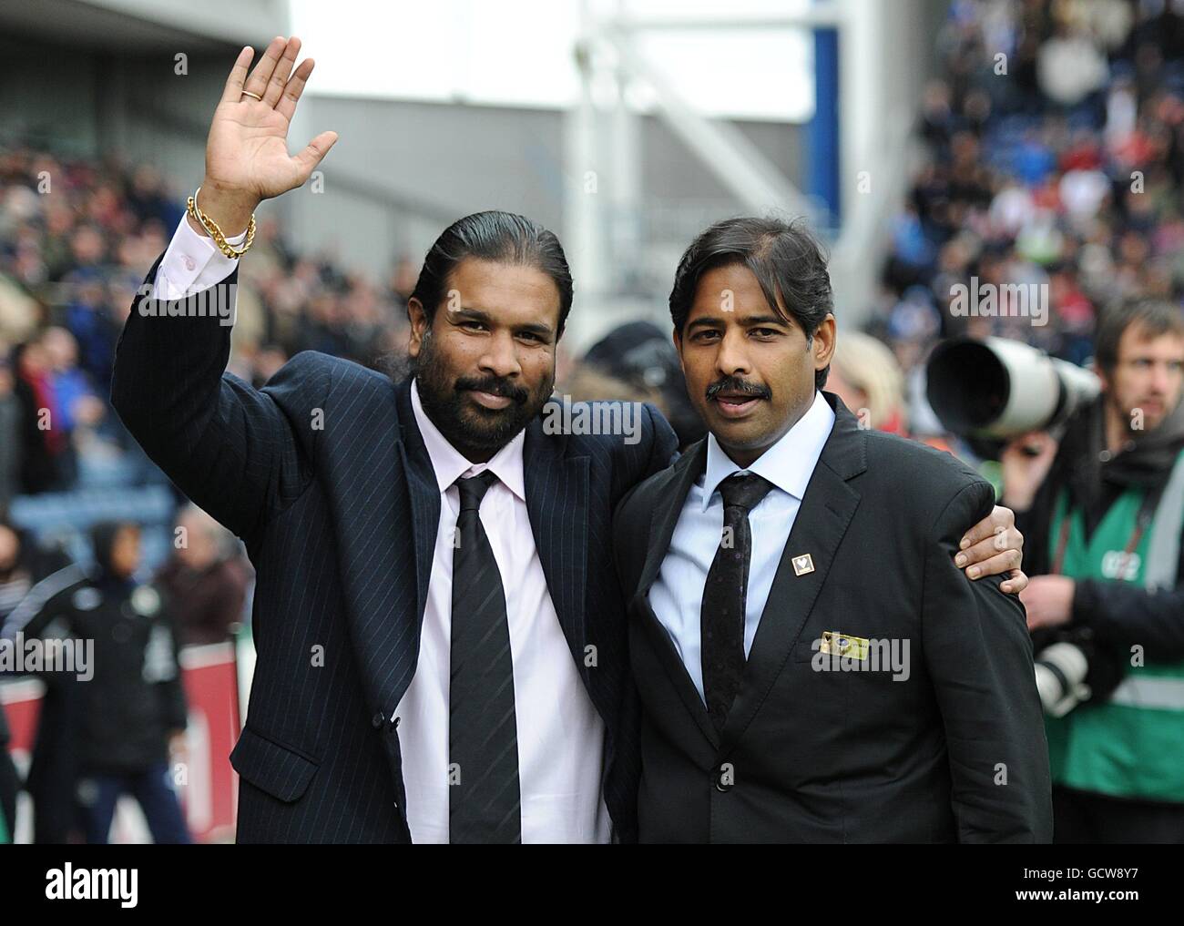 Venky's Managing Director Mr B.Balaji Rao (left) and Mr B.Venkatesh Rao are paraded around the pitch prior to kick-off as they have been confirmed as the new owners of Blackburn Rovers FC Stock Photo