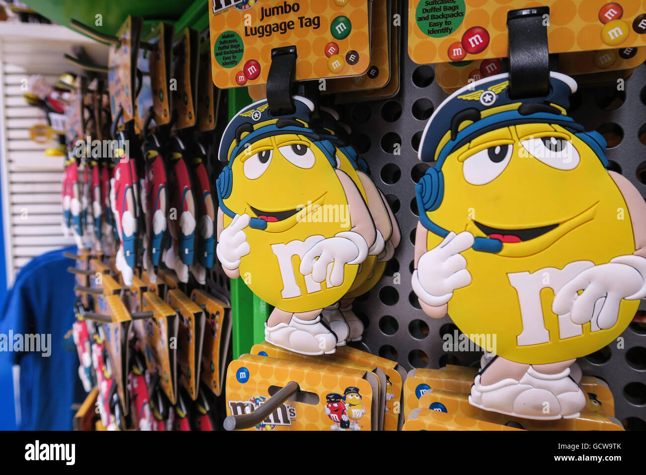 Yellow M&M Luggage Tags, M&M's World Store, Times Square, NYC Stock Photo