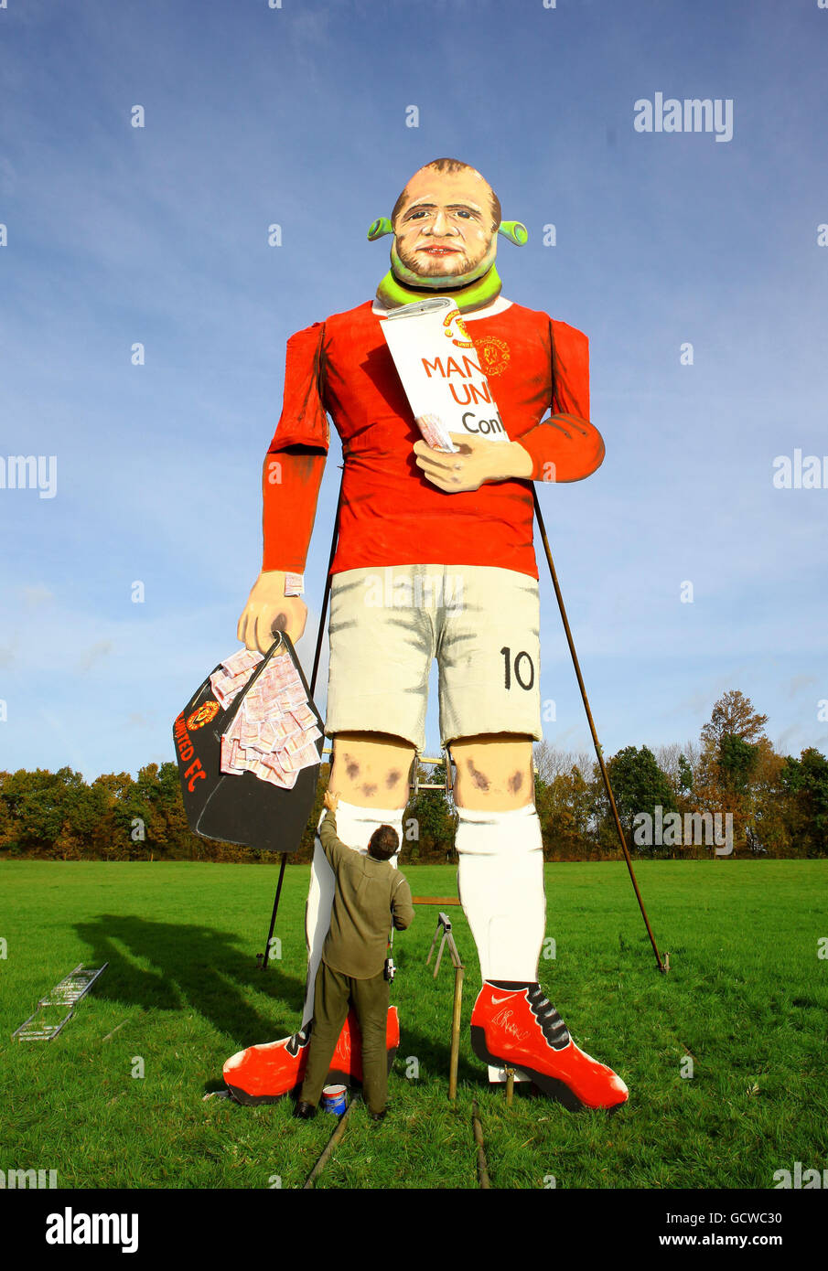 Barry Stableford of the Edenbridge Bonfire Society puts the final touches to the Edenbridge Celebrity Guy in Edenbridge, Kent, which this year is Wayne Rooney, ahead of the town's bonfire night display on Saturday. Stock Photo