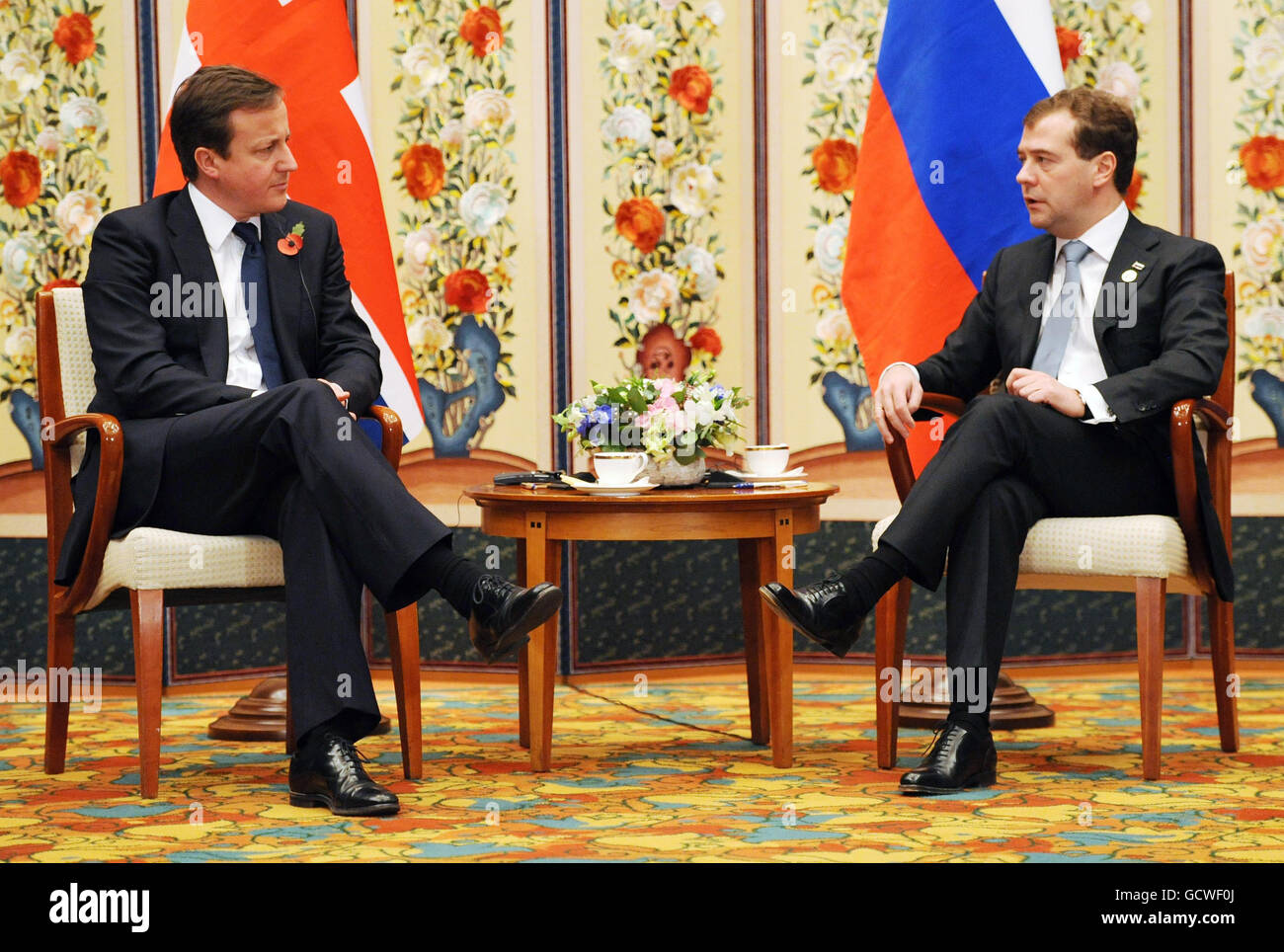 Prime Minister David Cameron holds a meeting with Russian President Dmitry Medvedev before the start of the G20 Summit in Seoul. Stock Photo