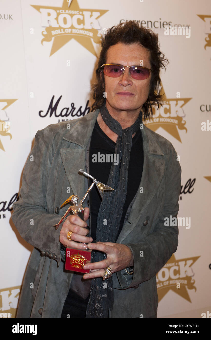 Glenn Hughes wins the 'ChildLine Rocks Awards' award at The Classic Rock Roll Of Honour at the Roundhouse in London. Stock Photo