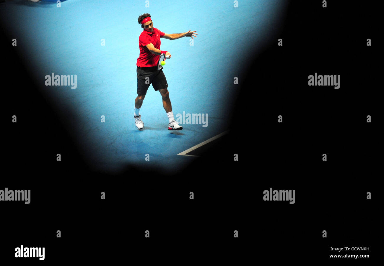 Switzerland's Roger Federer in action against Sweden's Robin Soderling on day six of the Barclays ATP World Tennis Tour Finals Stock Photo