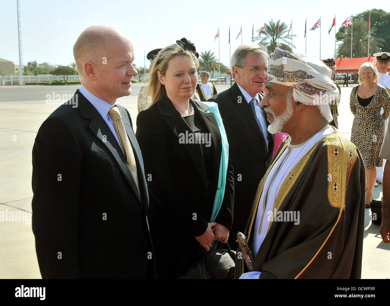 Foreign Secretary William Hague and his wife Ffion talk with the Sultan of Oman, His Majesty Sultan Qaboos bin Said, before departing Muscat Airport for home, after they accompanied Queen Elizabeth II and Duke of Edinburgh on a five day State Visit to the Gulf region. Stock Photo