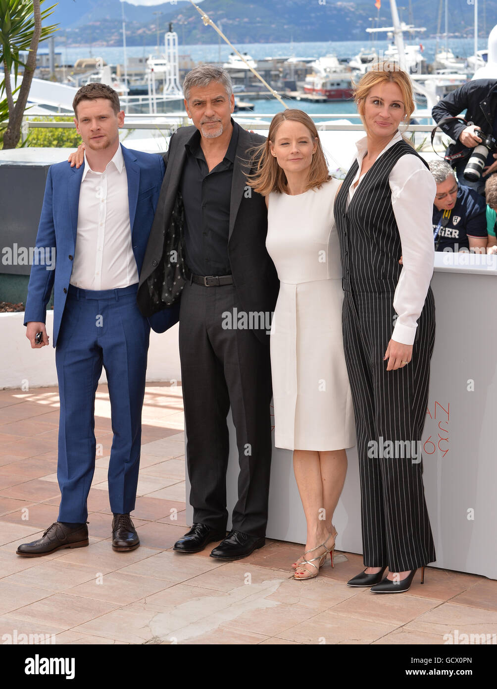 CANNES, FR - MAY 12, 2016: Actress/director Jodie Foster & actors Jack O'Connell, George Clooney & Julia Roberts at the photocall for 'Money Monster' at the 69th Festival de Cannes. Stock Photo
