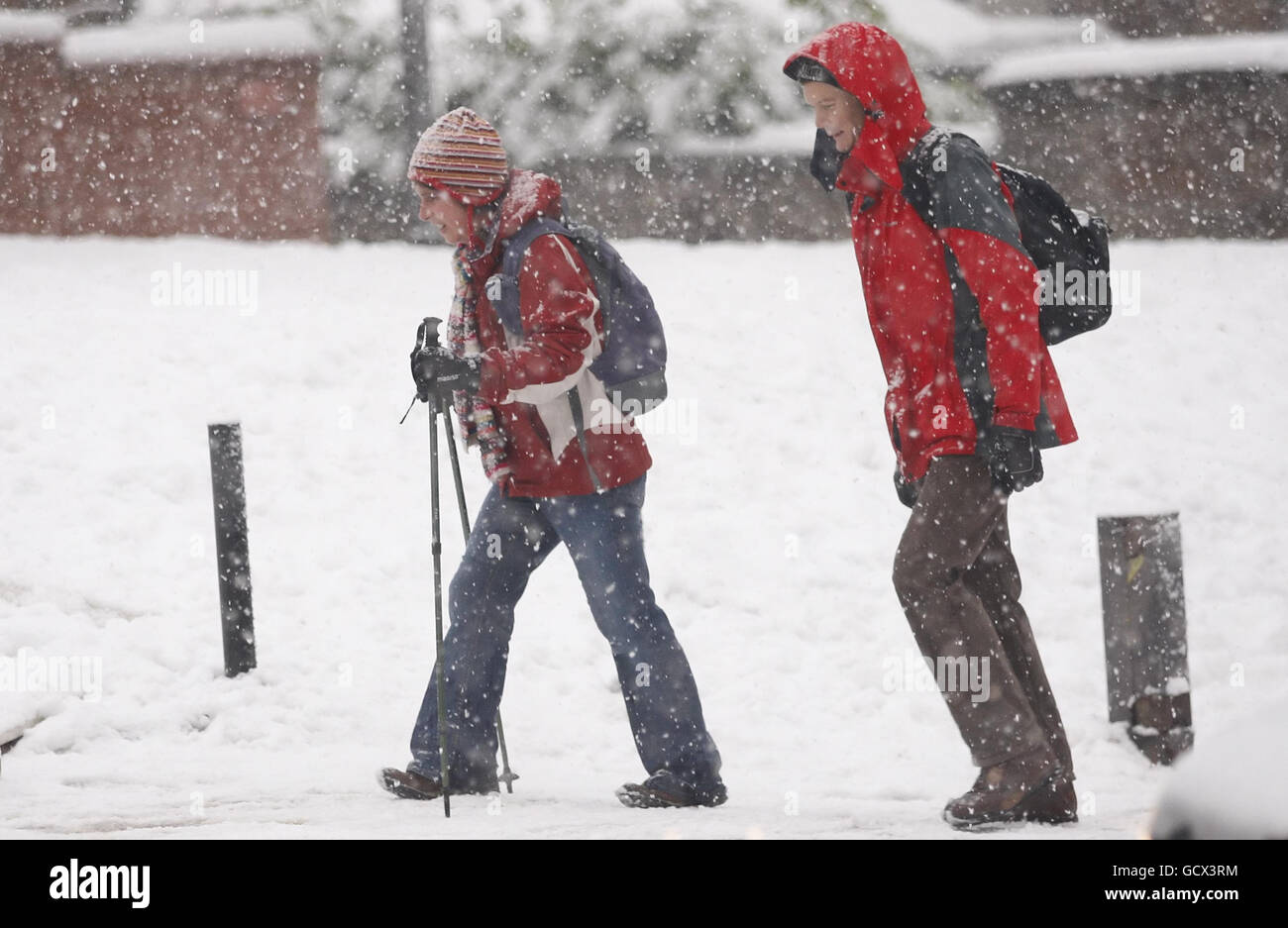 People make their way through fresh snow in Glasgow. Stock Photo