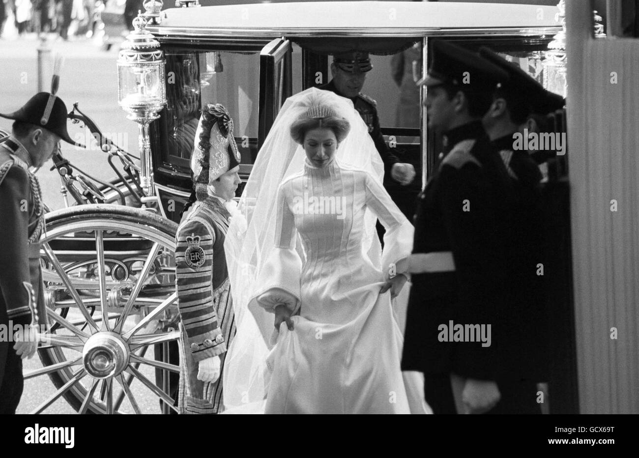 Princess Anne alights from the Glass Coach and enters the west door for her wedding to Captain Mark Phillips Westminster. Stock Photo