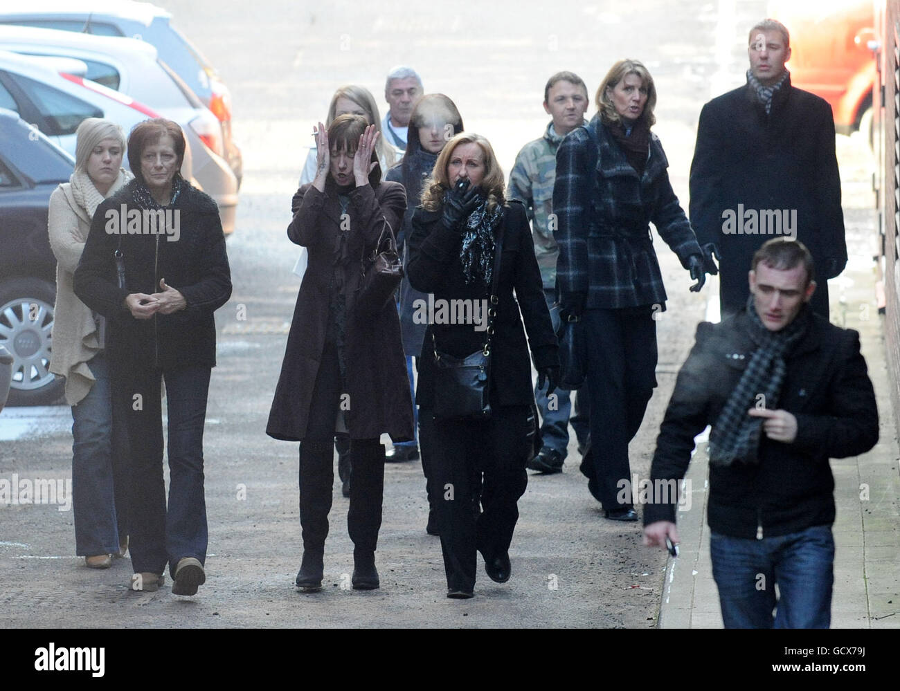 Family and friends of the murder victims leave Leeds Crown Court after 'Crossbow cannibal