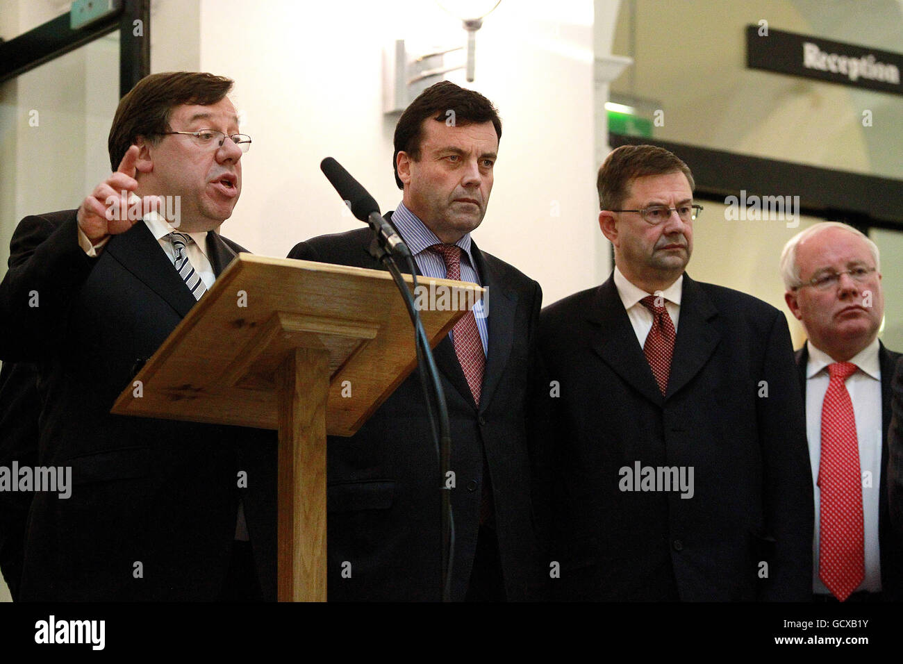 Irish Taoiseach Brian Cowen, with his front bench colleagues, after giving a statement to the waiting media on the steps of Government Buildings in Dublin, where refused to bow to public and political pressure for a general election saying serving the country's interests came above party politics. Stock Photo