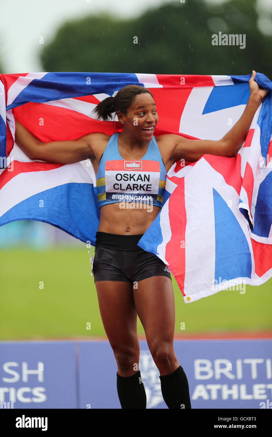 Shelayna OSKANCLARKE draped in the Union Jack Flag after winning the