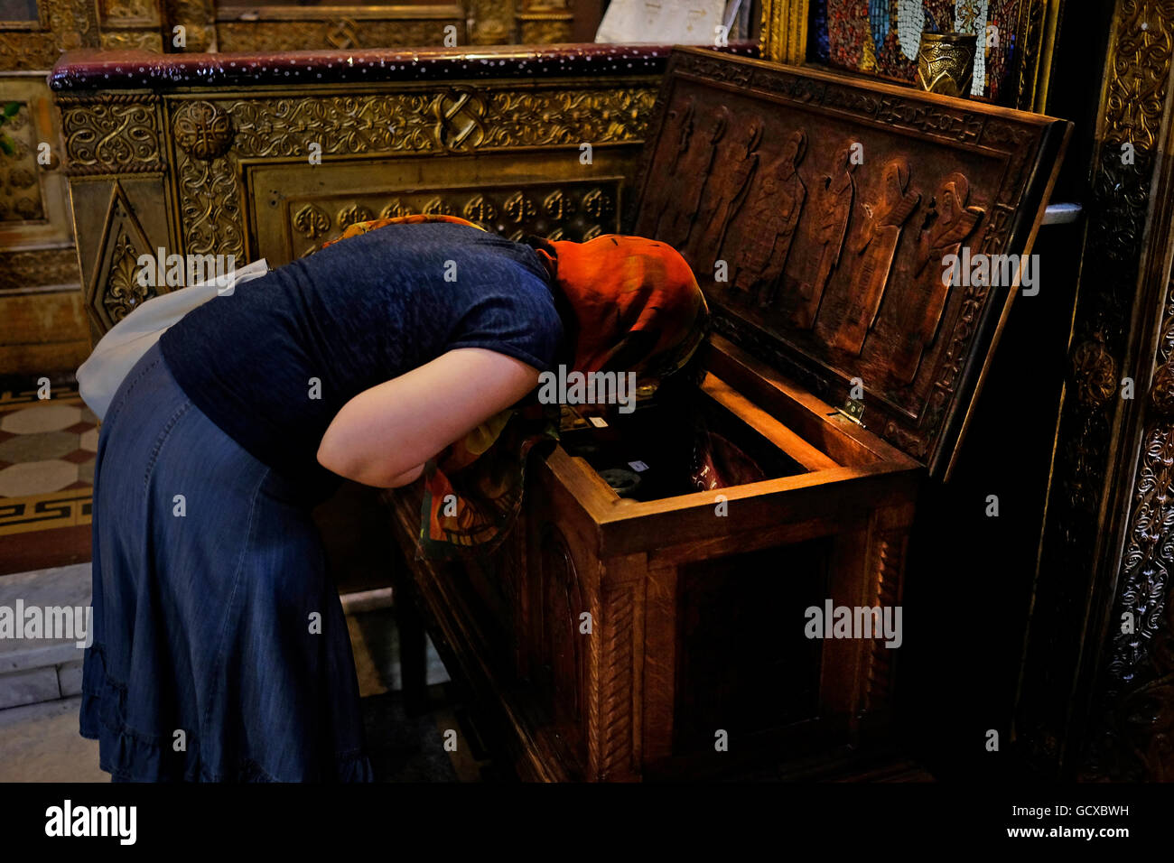 A Romanian Woman Praying Inside Saint Nicholas Russian Church