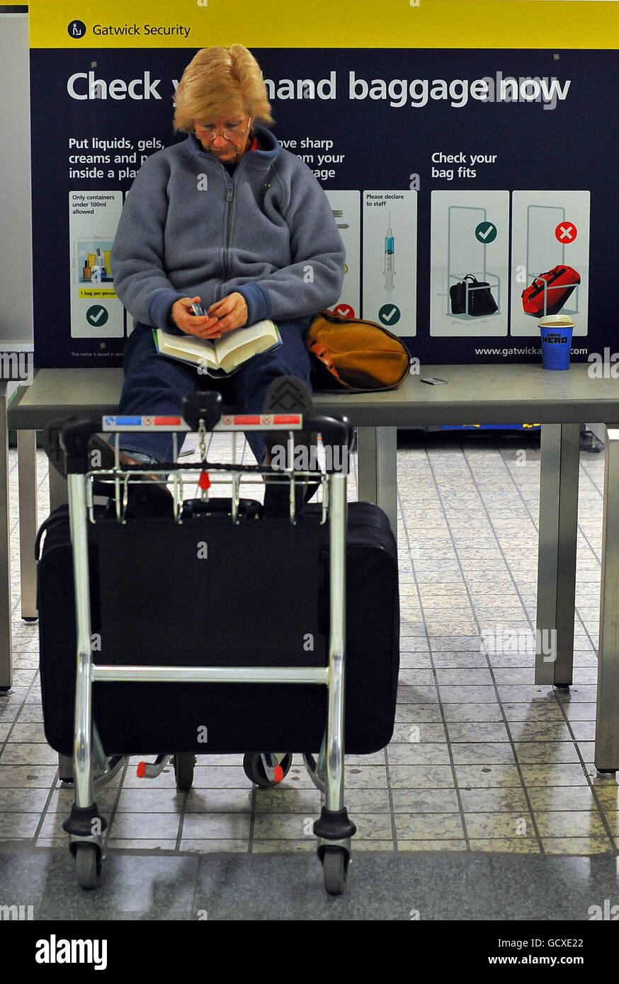 Full length reading luggage trolley mangkb hires stock photography and