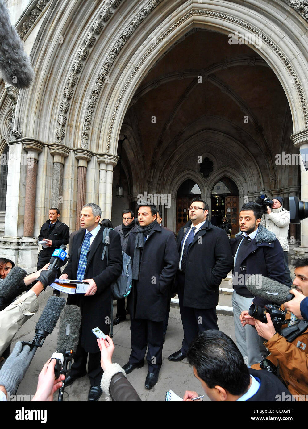 Andrew Katzen, solicitor for the relatives of Shrien Dewani, reads a statement on behalf of the family outside the Royal Courts of Justice, London. Stock Photo