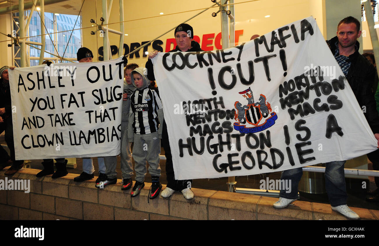 Fans demonstrate outside the entrance to James Park prior to kick off during the Barclays Premier League match at St James' Park, Newcastle. Stock Photo