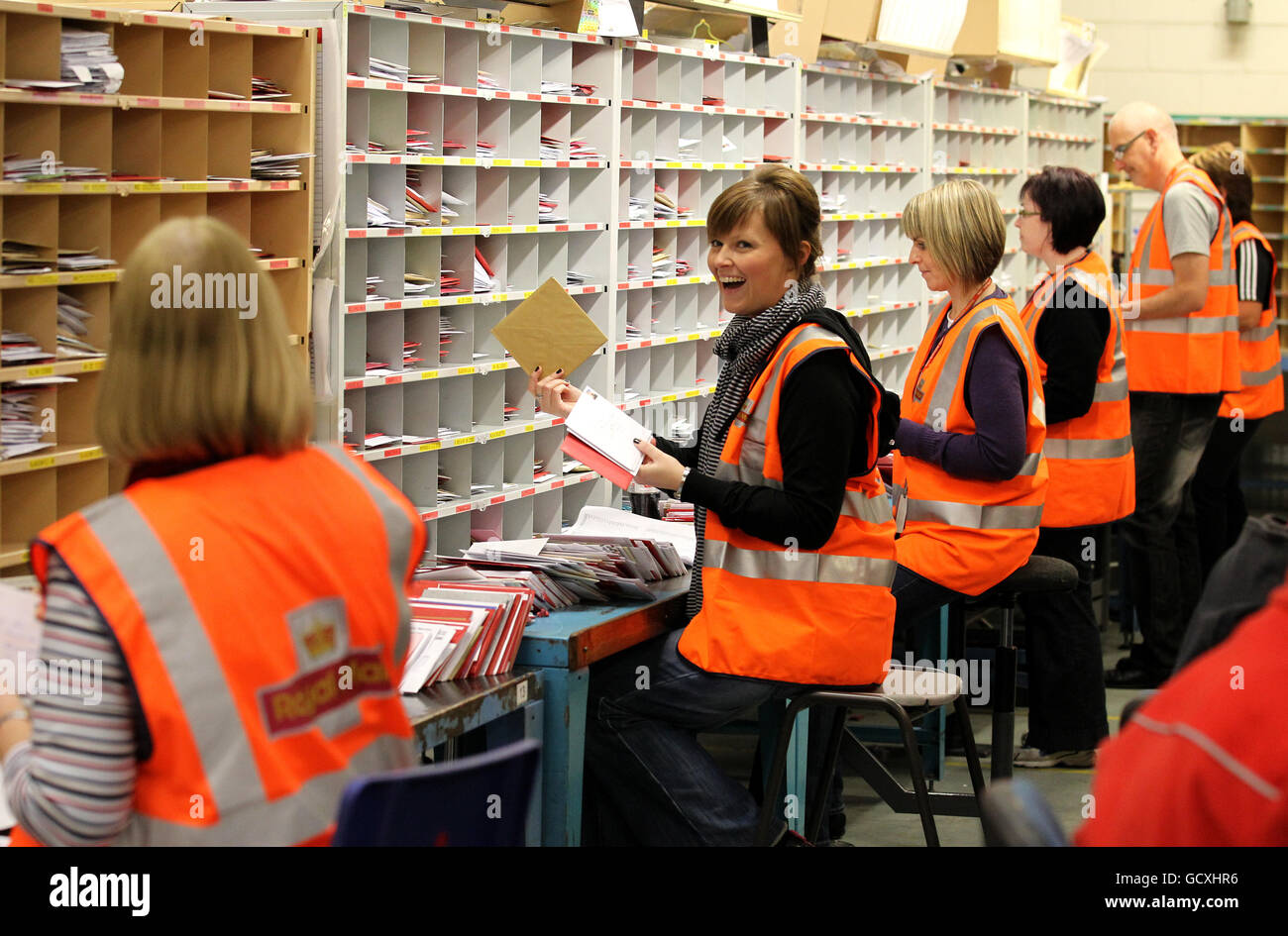 Royal Mail staff at the St. Rollox sorting office in Glasgow as they
