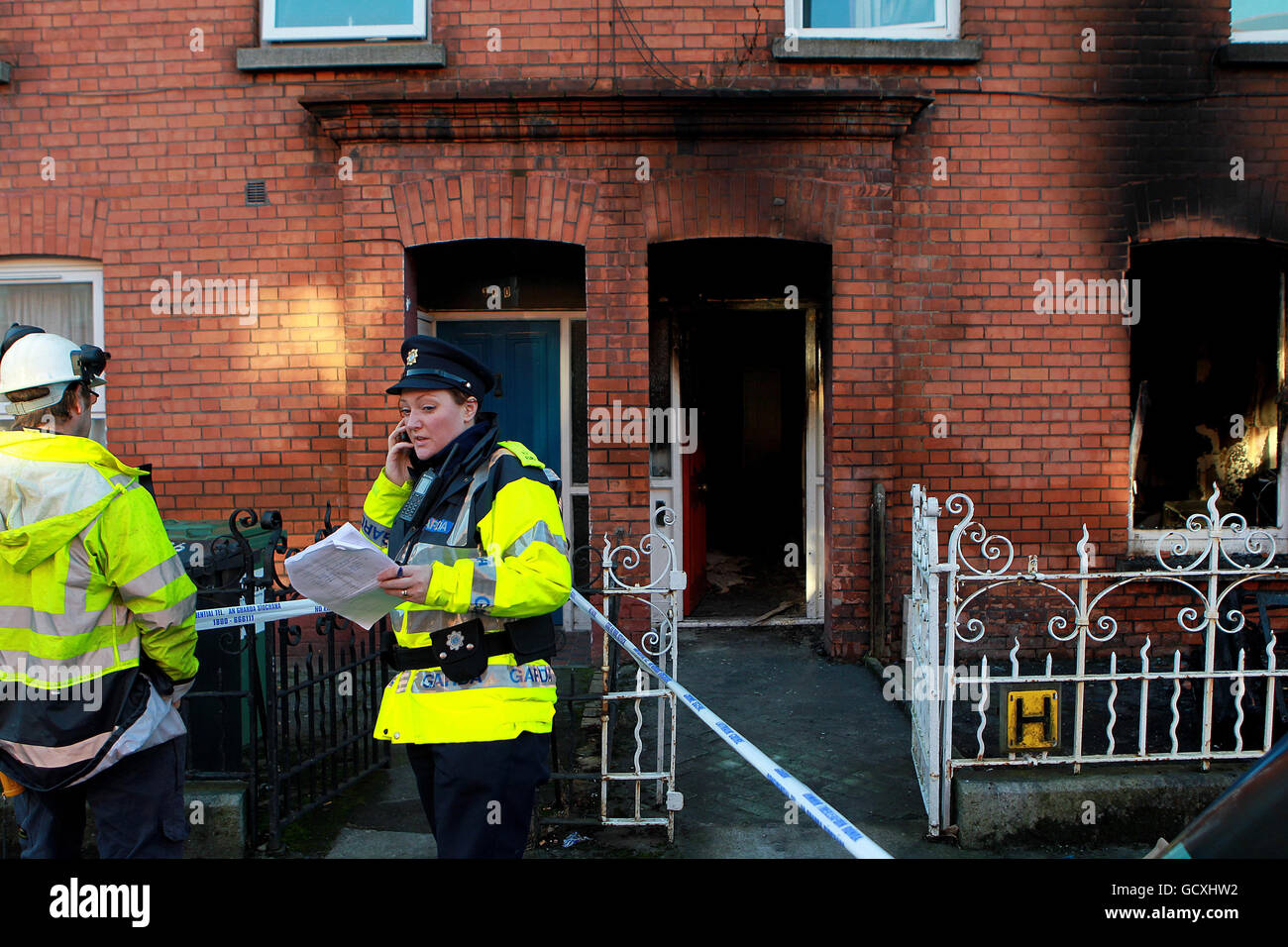 Man dies in Dublin fire. Gardai at the scene of a fire in Cabra Park in ...