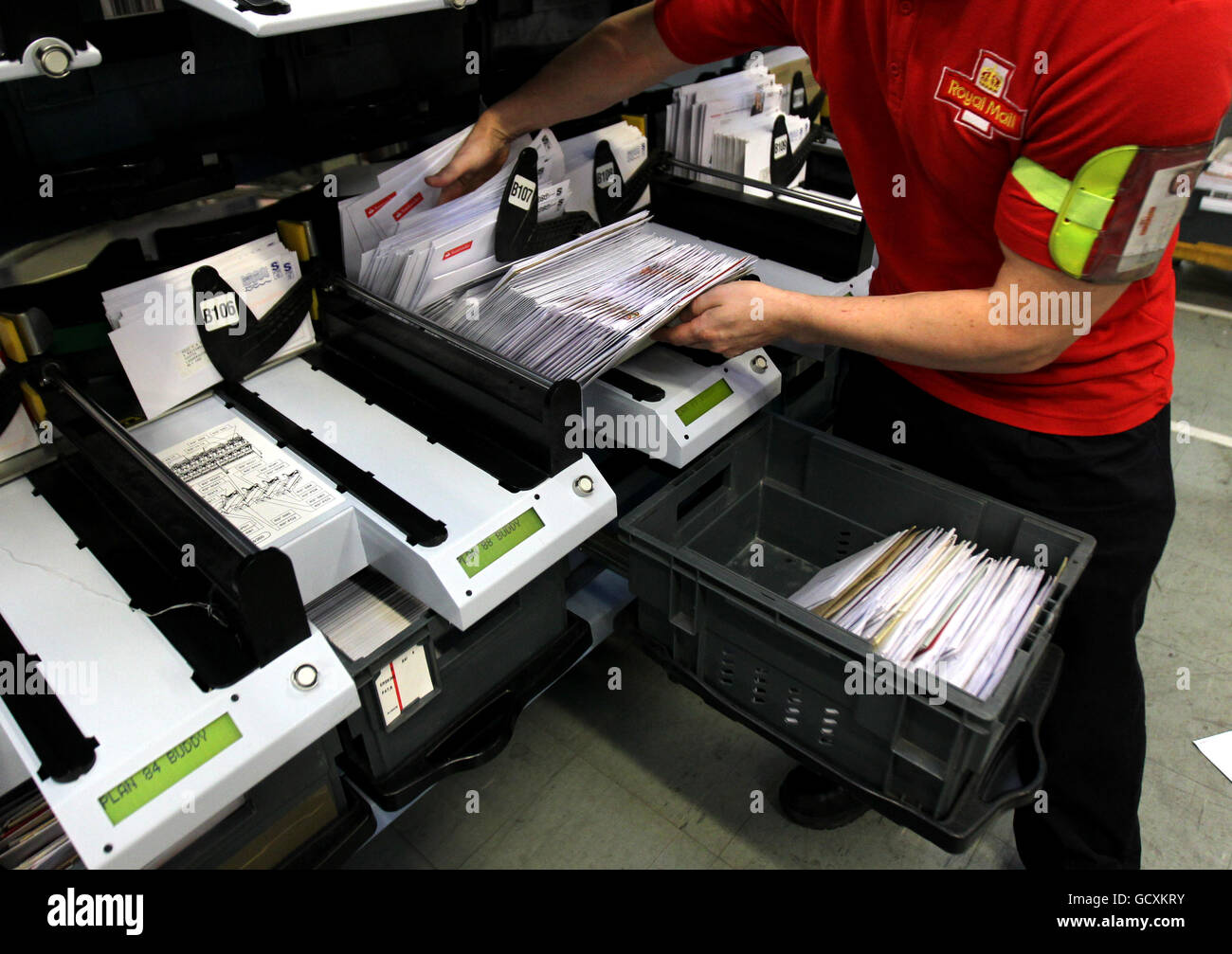Royal Mail staff at the St Rollox sorting office in Glasgow as they