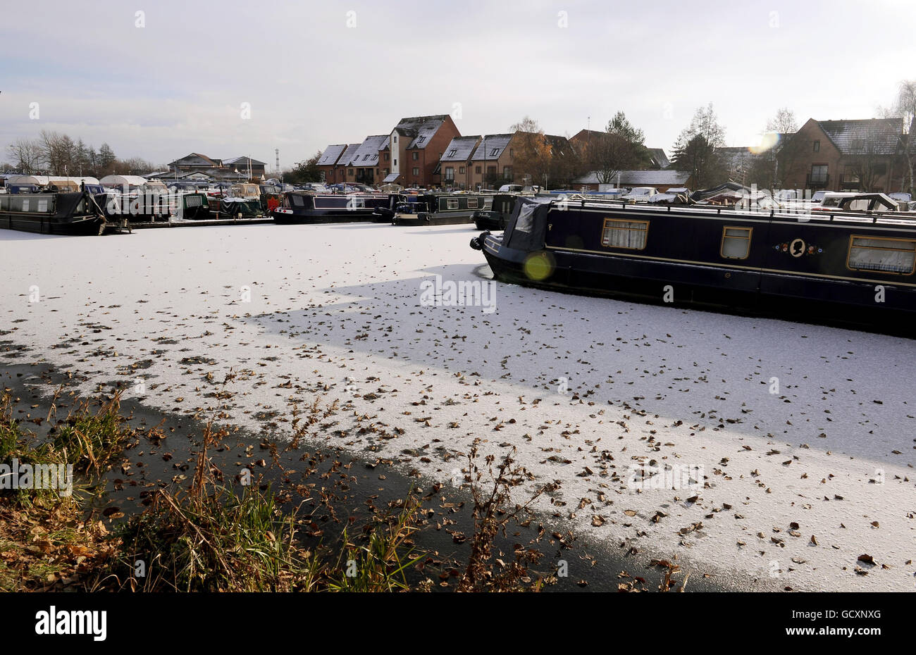 Castle Marina in Nottingham as canal boats lie frozen in their moorings