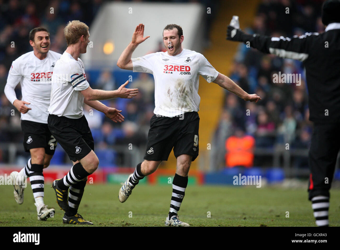 Swansea City's Craig Beattie celebrates scoring his sides' third goal