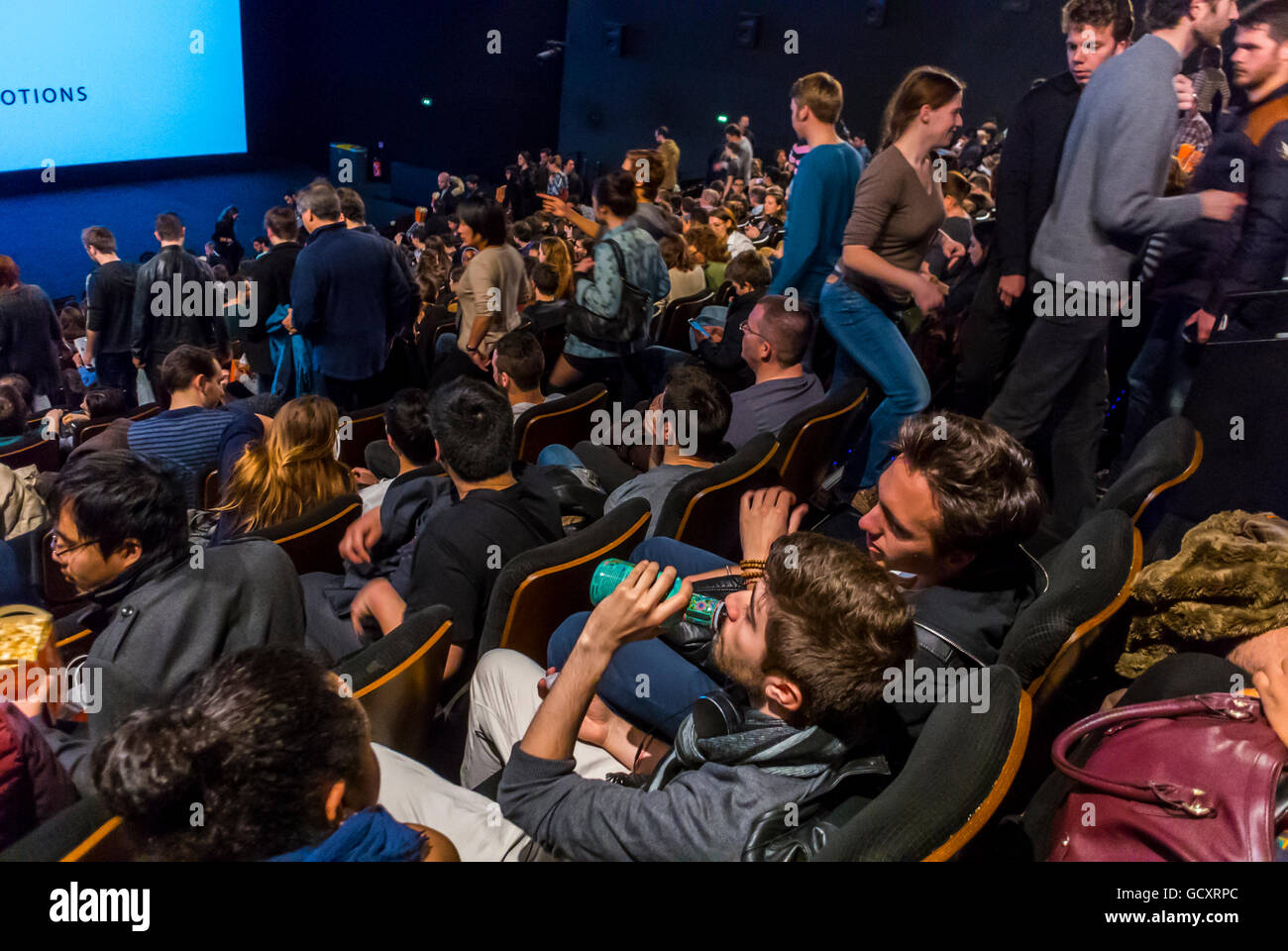 Paris, France, Rear, Large Crowd of People in Audience sitting in French Cinema Theatre, 'UGC Ciné Cité Bercy' before film, inside a theater Stock Photo